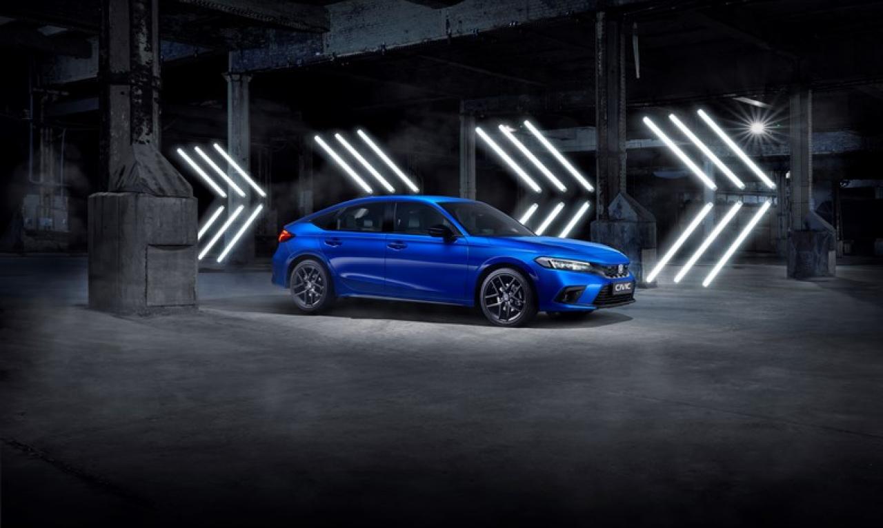 368575_Der_brandneue_Honda_Civic_berzeugt_mit_einem_herausragenden_Mix_an_Dynamik.jpg Honda Civic Seitenansicht